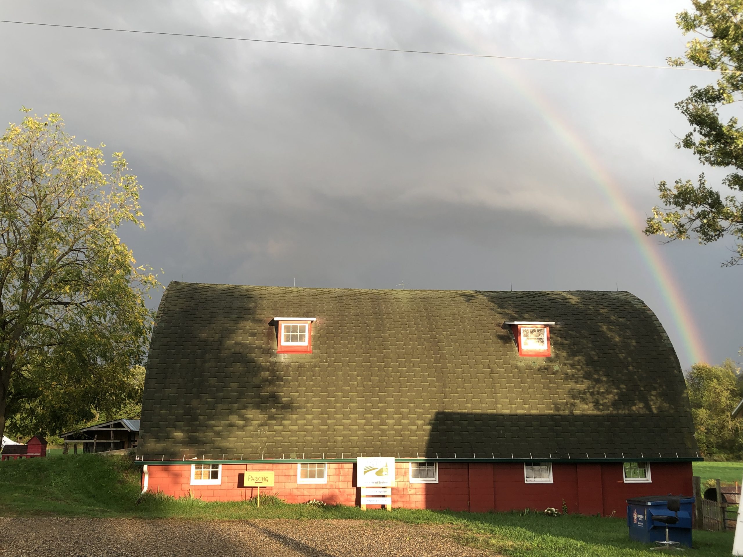 Participants and staff working together on AACORN's 40-acre Kalamazoo County farm.