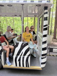 Participants and family members on the zoo train.